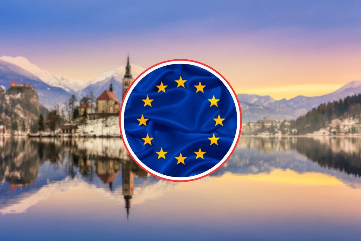 sfondo di un lago in inverno e bandiera europea in primo piano